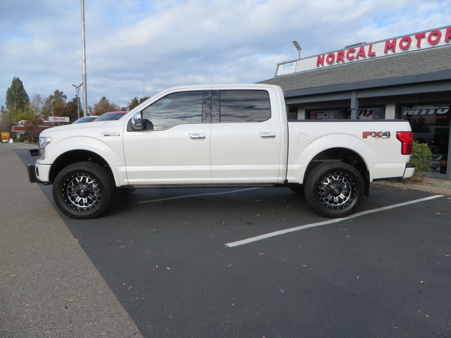 2019 White /BLACK INT W/DARK MARSALA LT Ford F-150 Platinum SuperCrew Cab 4WD (1FTEW1E45KF) with an 3.5L V6 ECOBOOST engine, 10-SPEED AUTO W/TOW MO transmission, located at 2630 Grass Valley Highway, Auburn, CA, 95603, (530) 508-5100, 38.937893, -121.095482 - F150 Platinum featuring a level kit, Fuel Offroad wheels, Toyo AT2 tires, Barricade Front winch bumper, Smittybilt winch, LED light bar, Undercover Ultraflex bedcover, and a Cargo Glide bed system. - Photo#7